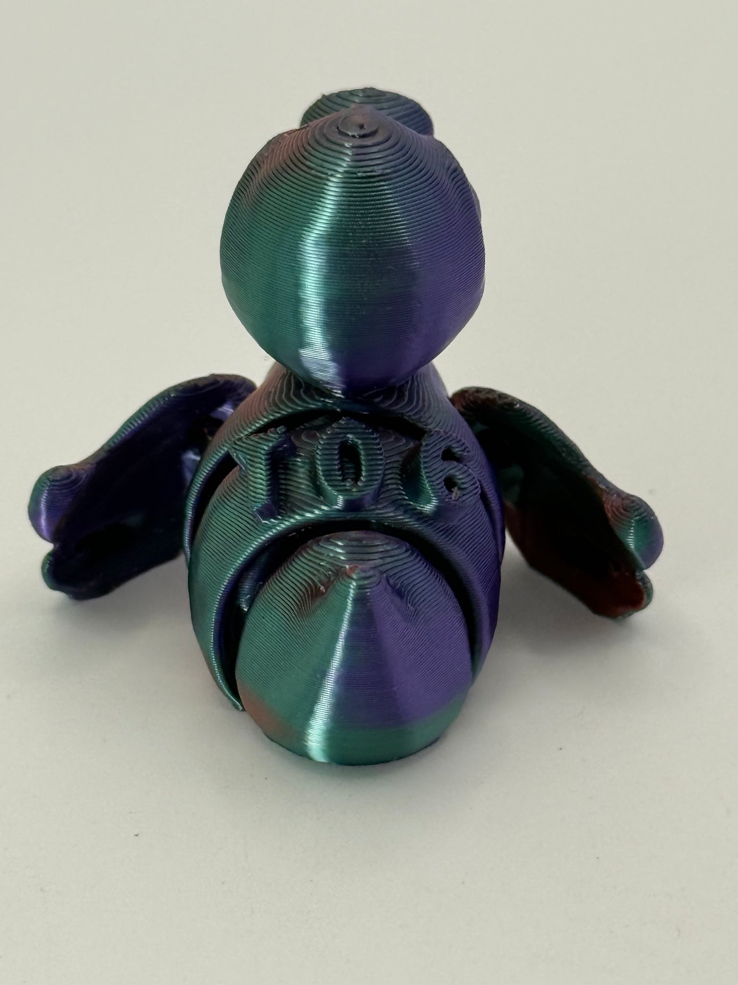 T06: Silk Green Purple Copper